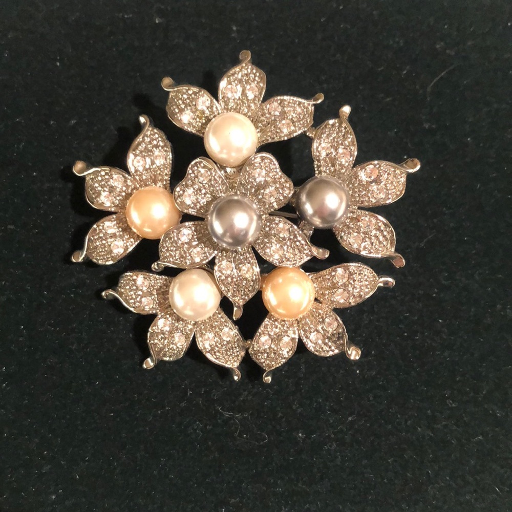 Brooch.